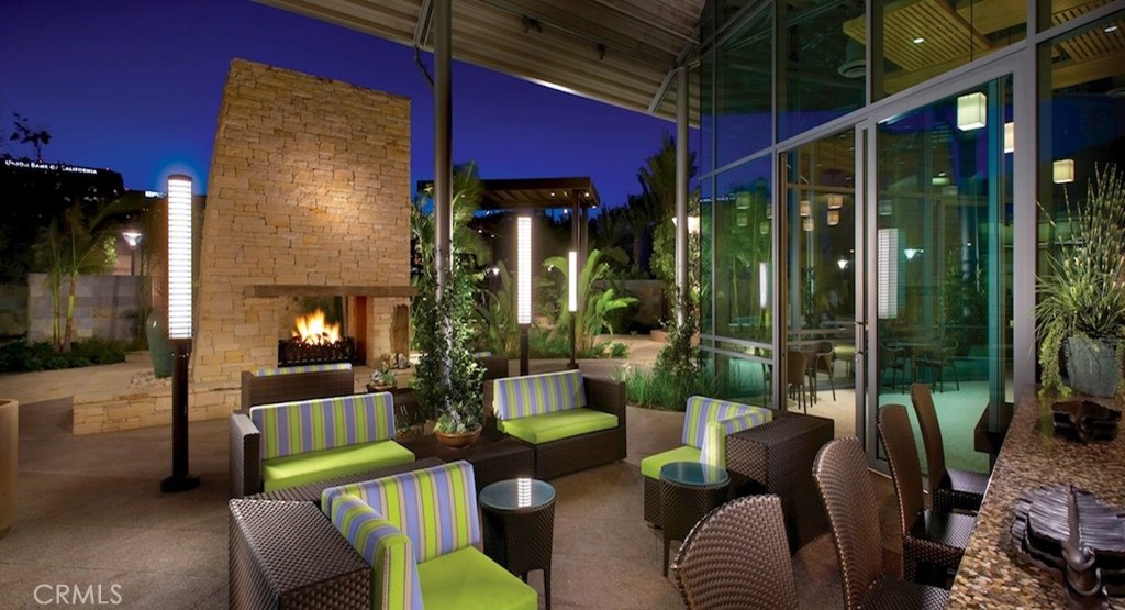 75 Lennox Irvine, CA 92612 - Photo 67 of 71 a view of a patio with couches chairs and a potted plant