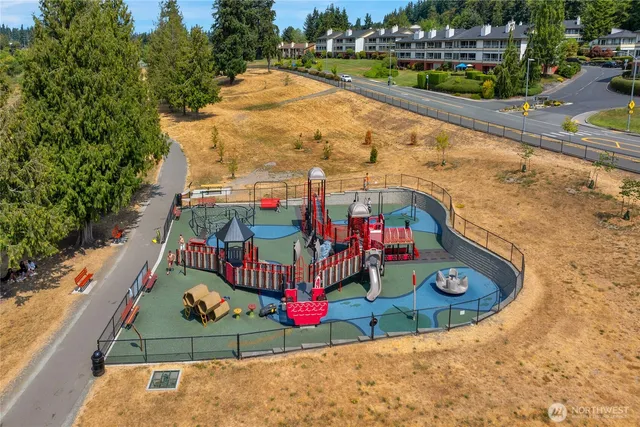 an aerial view of a house with a garden and plants