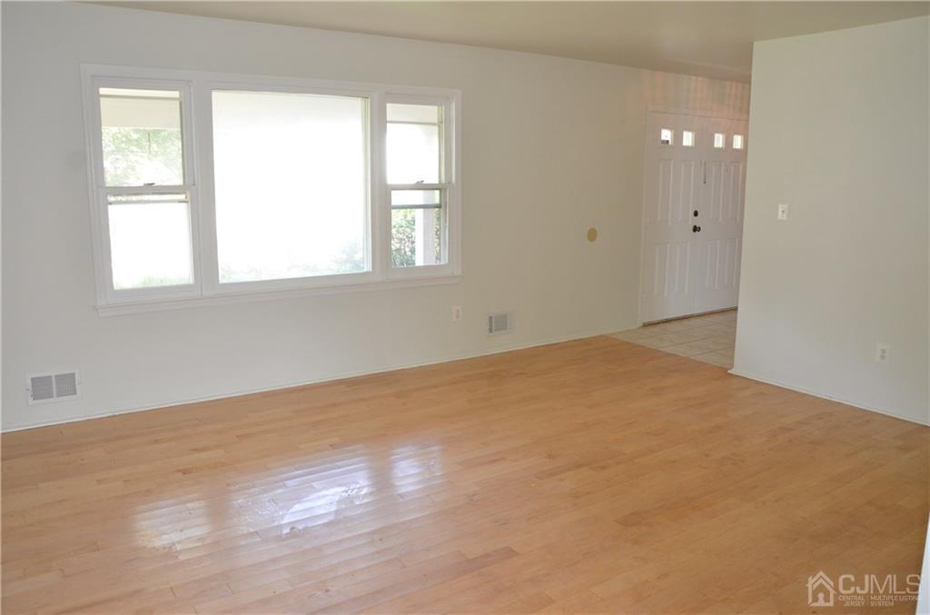 27 Sinclair Road Edison, NJ 08820 - Photo 10 of 15 an empty room with windows and closet