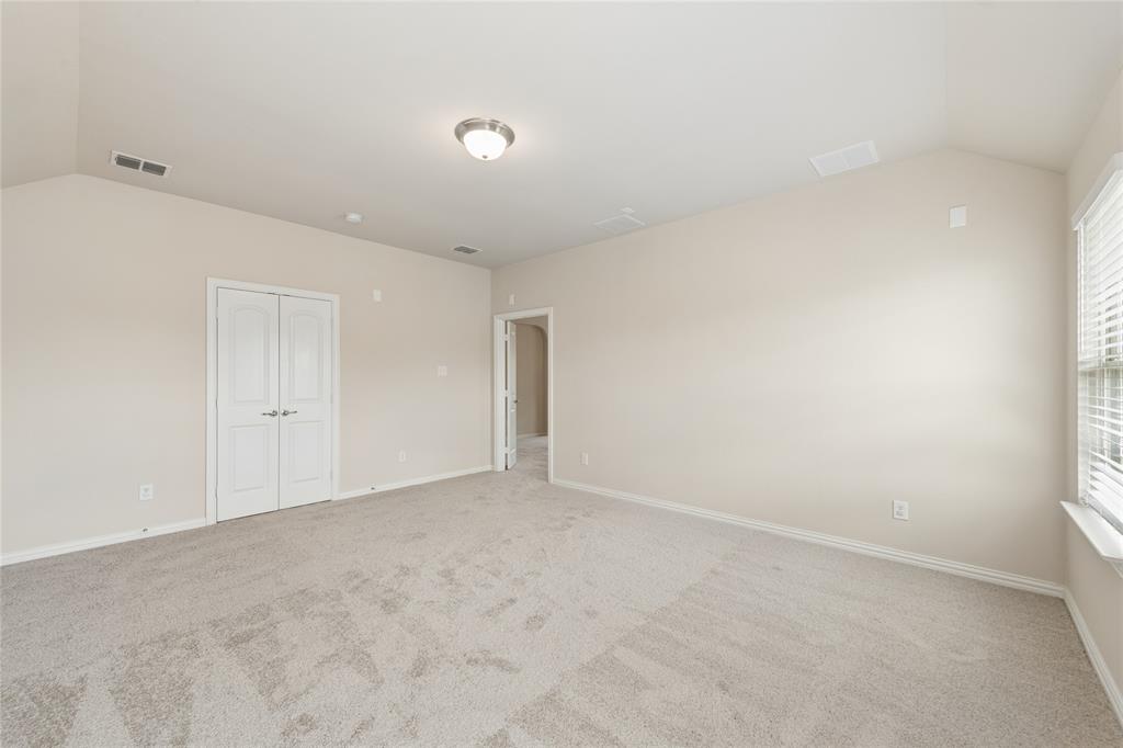 12571 Valley Spring Drive Frisco, TX 75035 - Photo 32 of 39 a view of an empty room