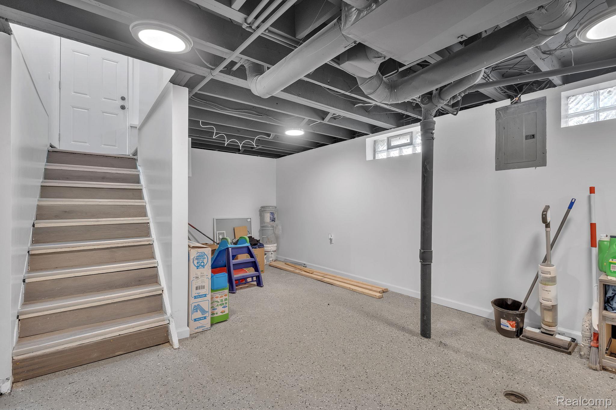 8401 Fielding Street Detroit, MI 48228 - Photo 19 of 34 Below grade area featuring stairway and electric panel