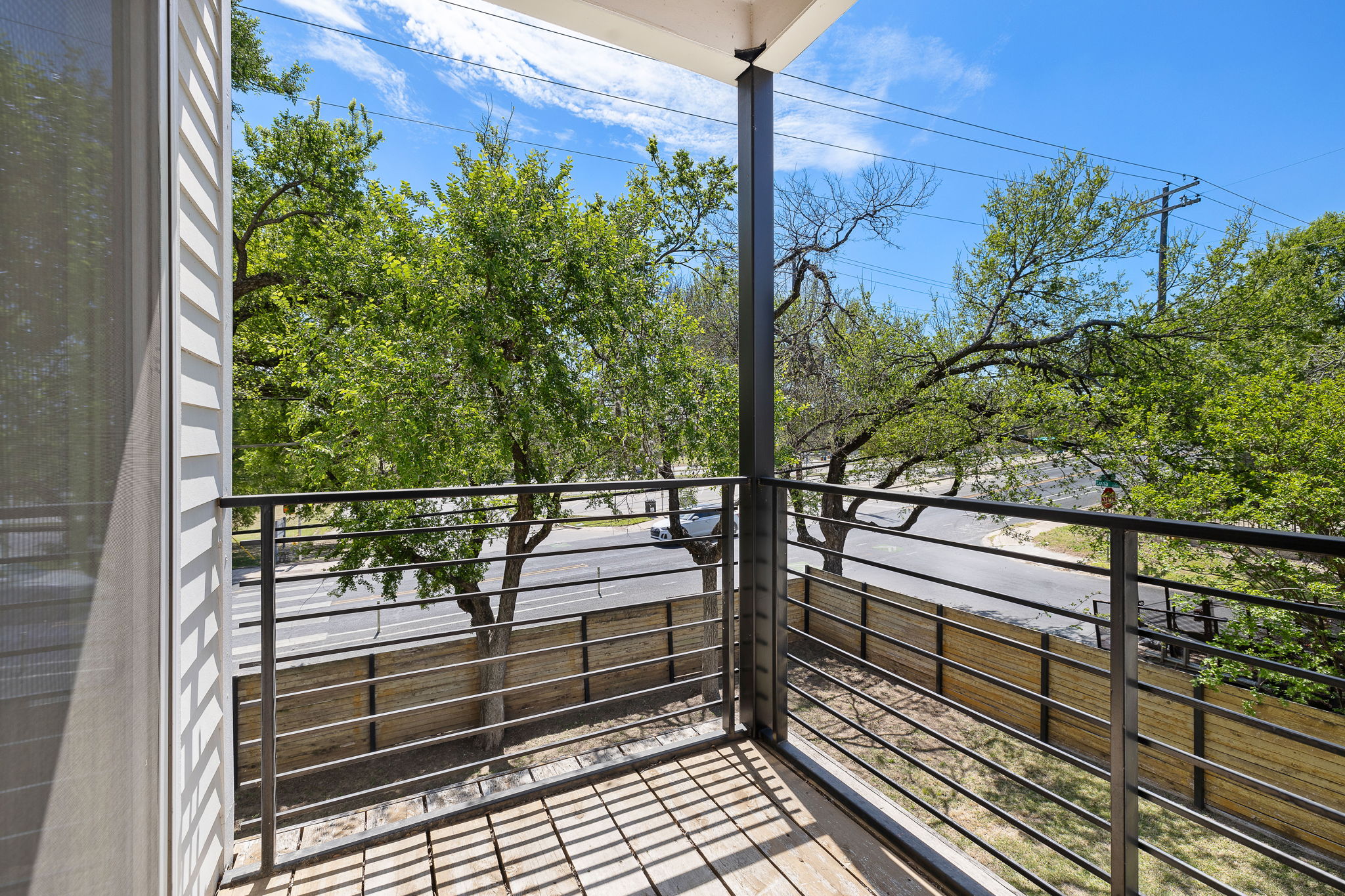 1201 Luna Street Austin, TX 78721 - Photo 18 of 31 a view of a balcony with a potted plant