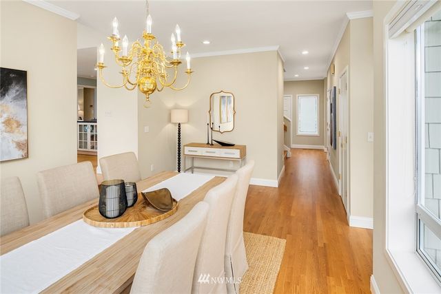 a dining room with wooden floor