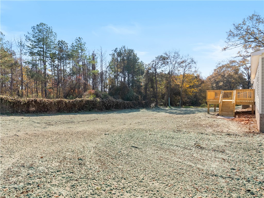 401 Mormon Church Road Seneca, SC 29678 - Photo 37 of 43 The expansive backyard offers ample outdoor living space, perfect for recreation or relaxation.