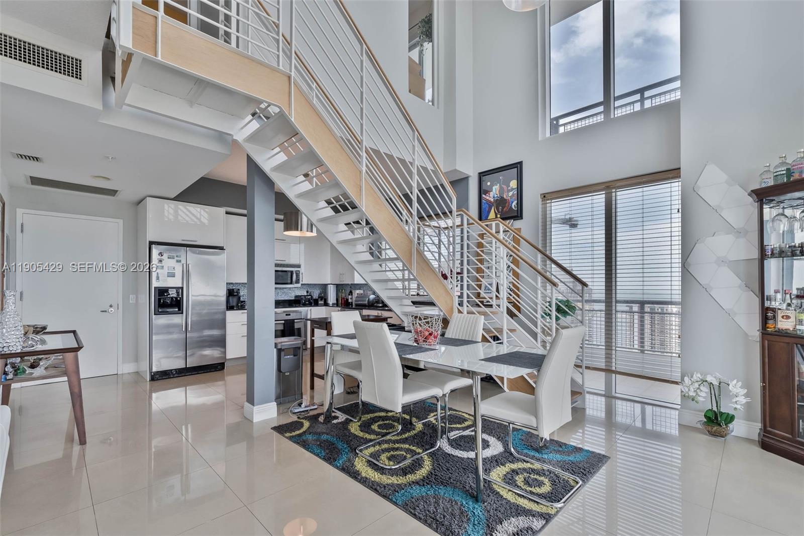 60 Southwest 13th Street, Unit 3401 Miami, FL 33130 - Photo 13 of 42 Two story loft unit. The desirable "01" line of the Infinity building.