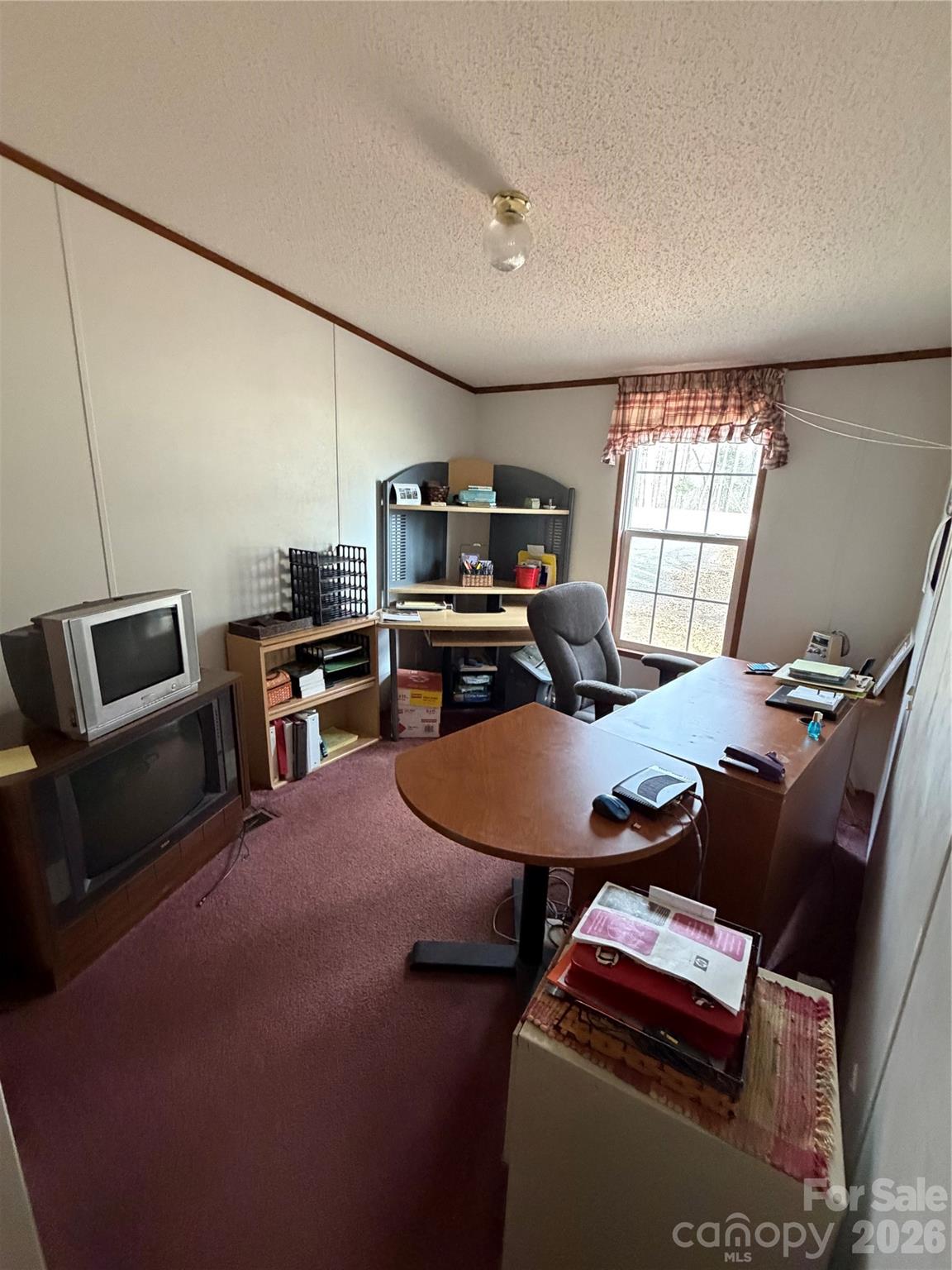 1011 Kiser Dairy Road Dallas, NC 28034 - Photo 10 of 17 a room with furniture and a flat screen tv