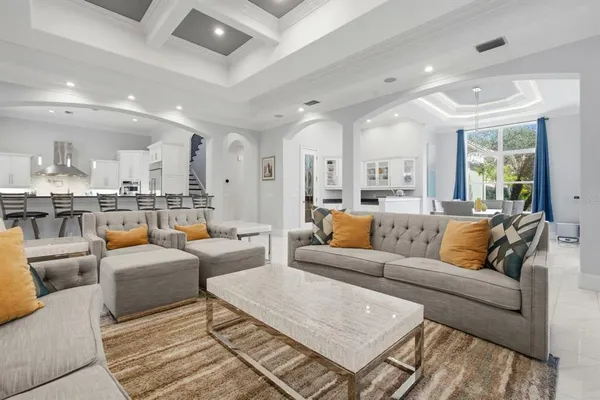 a kitchen with stainless steel appliances granite countertop a sink and a stove