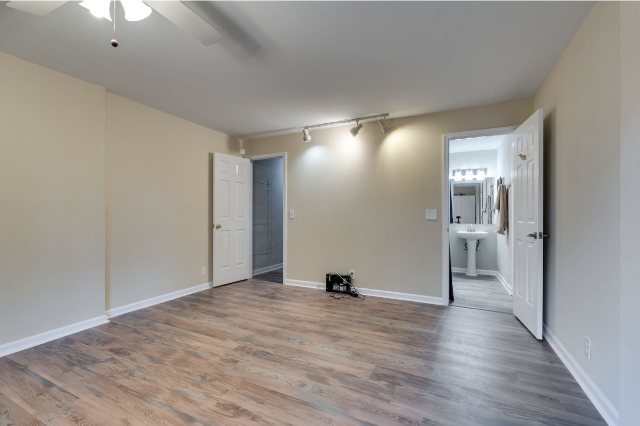 515 Upsall Drive Antioch, TN 37013 - Photo 24 of 31 a view of a big room with wooden floor and a bathroom