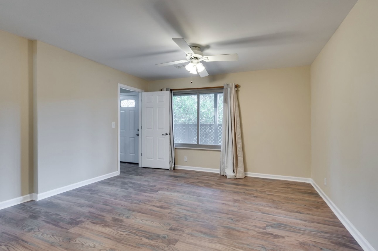 515 Upsall Drive Antioch, TN 37013 - Photo 25 of 31 wooden floor in an empty room with a window
