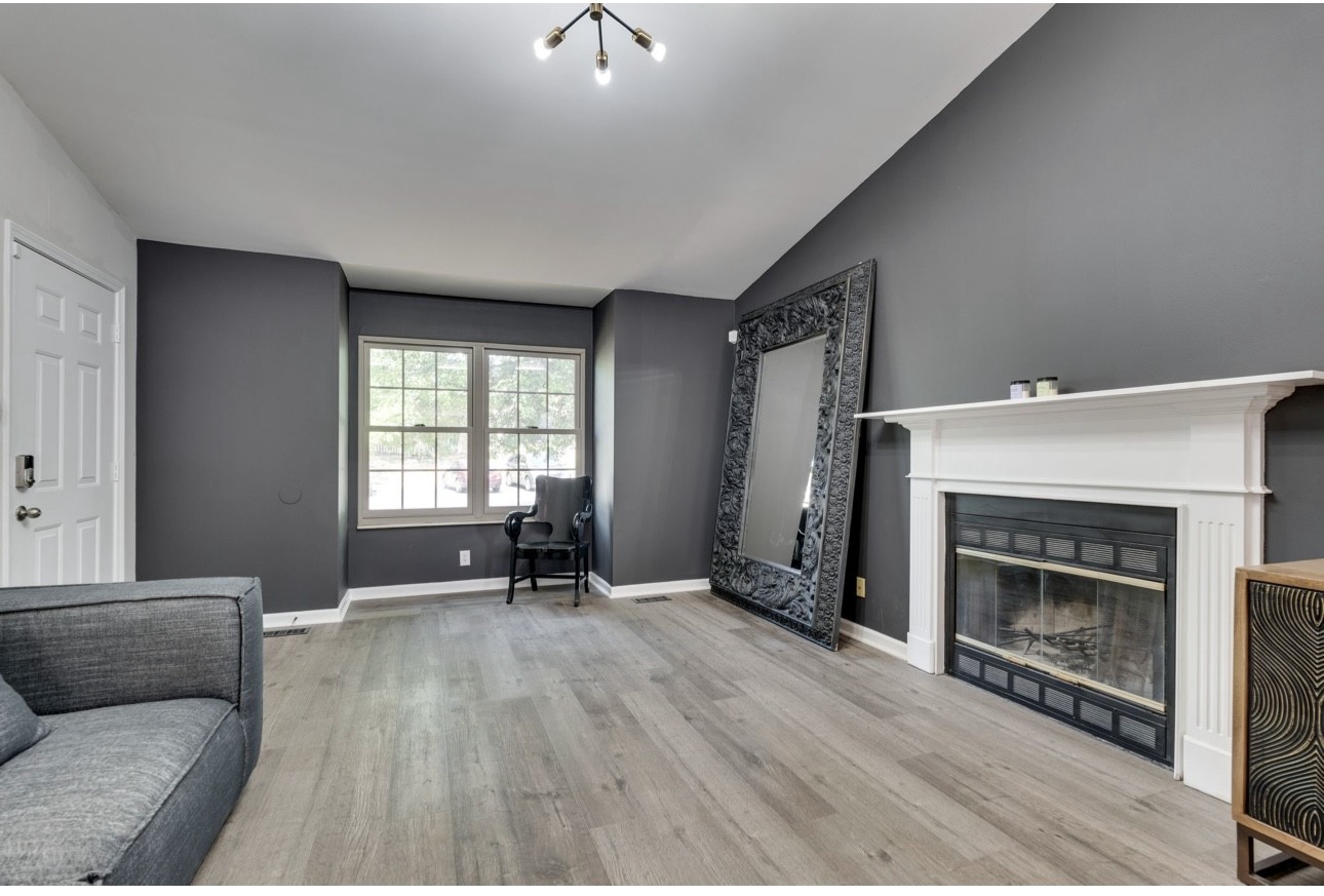 515 Upsall Drive Antioch, TN 37013 - Photo 6 of 31 a living room with furniture and a fireplace