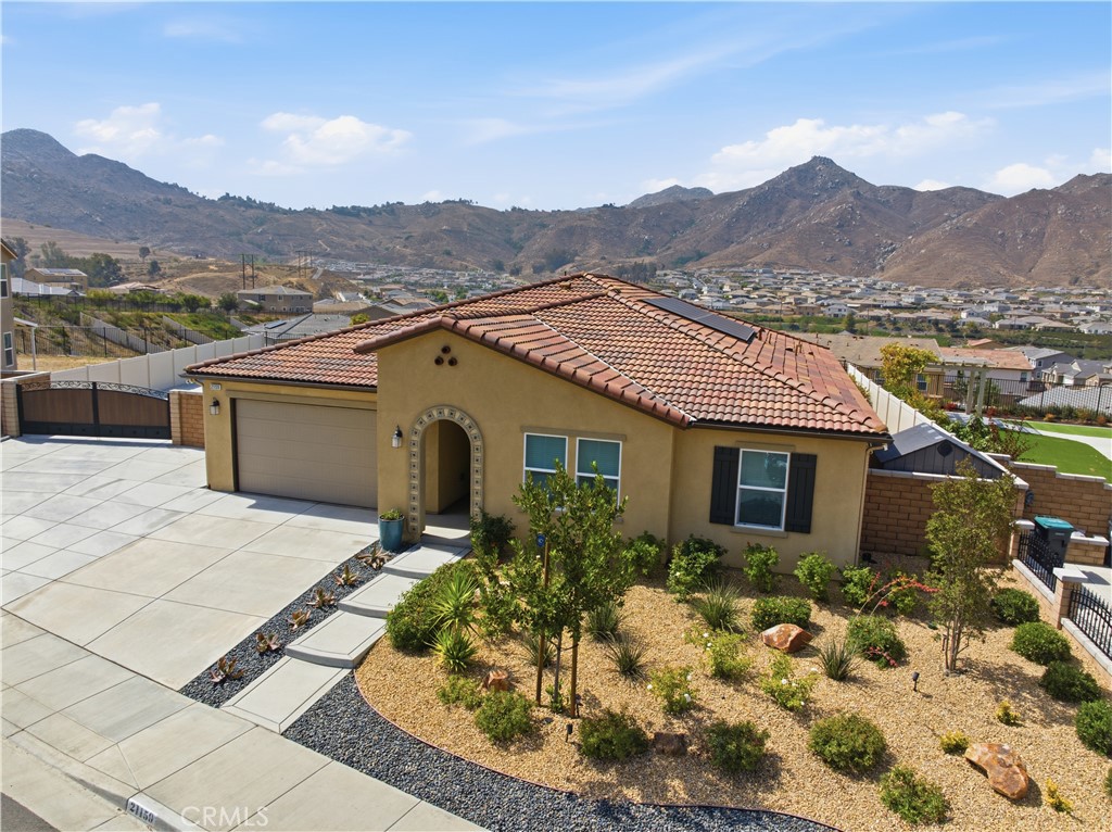21159 Blue Jeans Court Riverside, CA 92507 - Photo 12 of 63 a view of a house with a yard