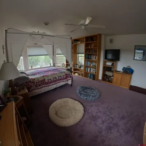 a bathroom with a double vanity sink and mirror