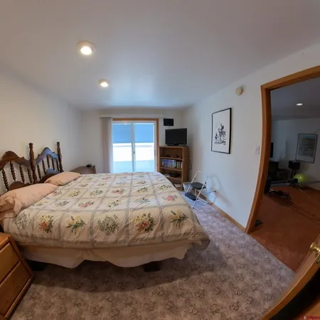 a room with furniture and wooden floor