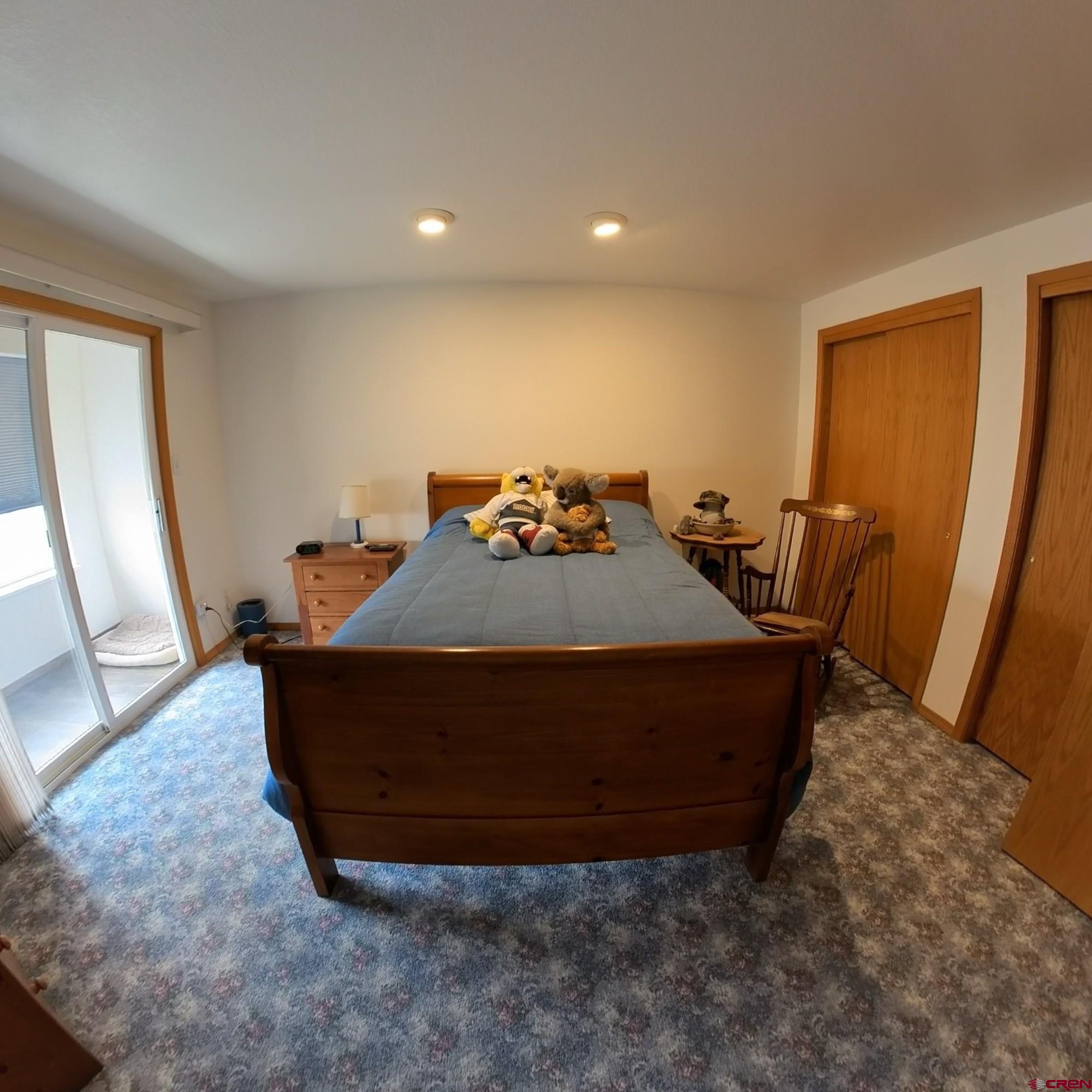 16709 Cedar Lane Cedaredge, CO 81413 - Photo 21 of 35 a room with furniture and wooden floor