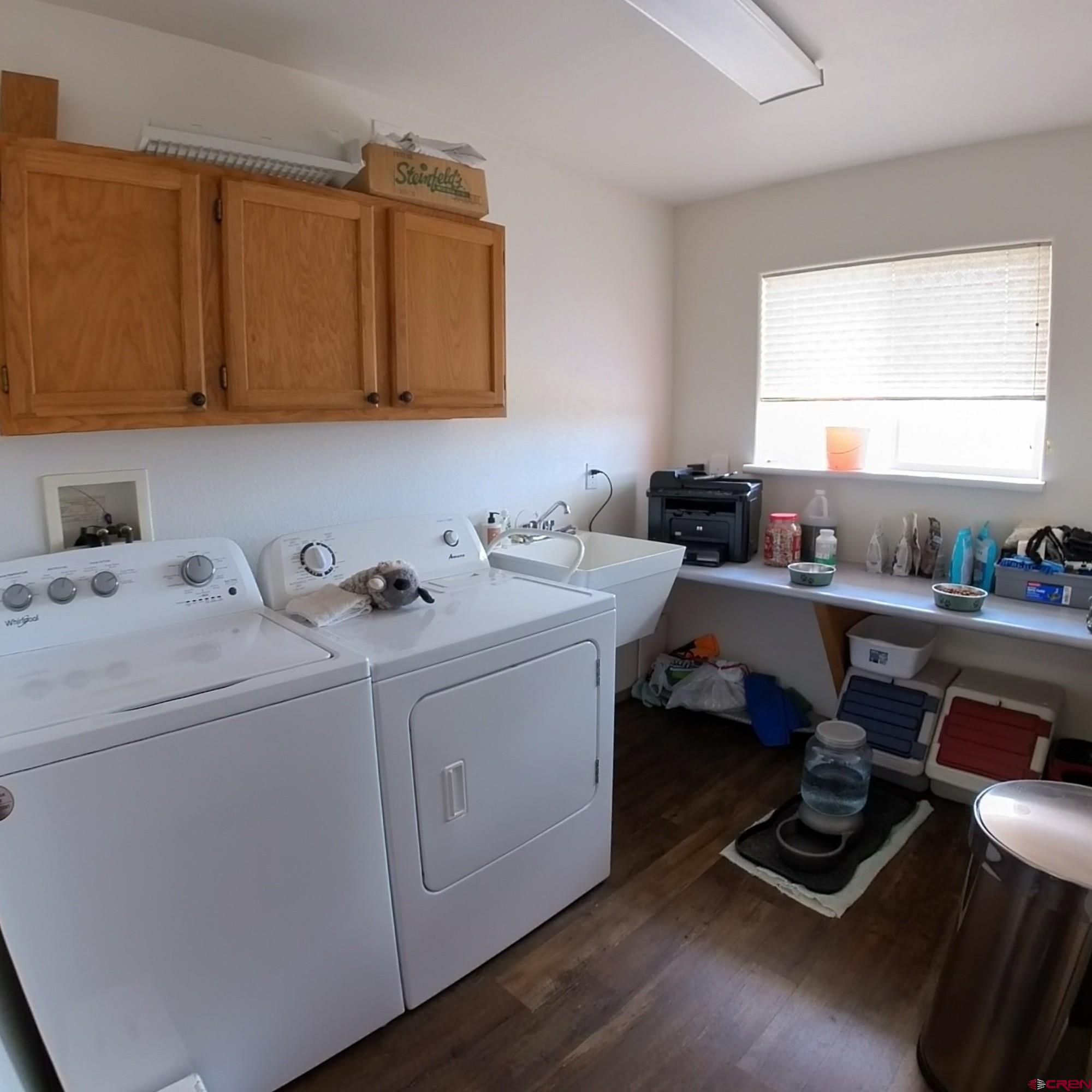 16709 Cedar Lane Cedaredge, CO 81413 - Photo 27 of 35 a room with storage and utility