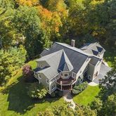 a view of a house with backyard