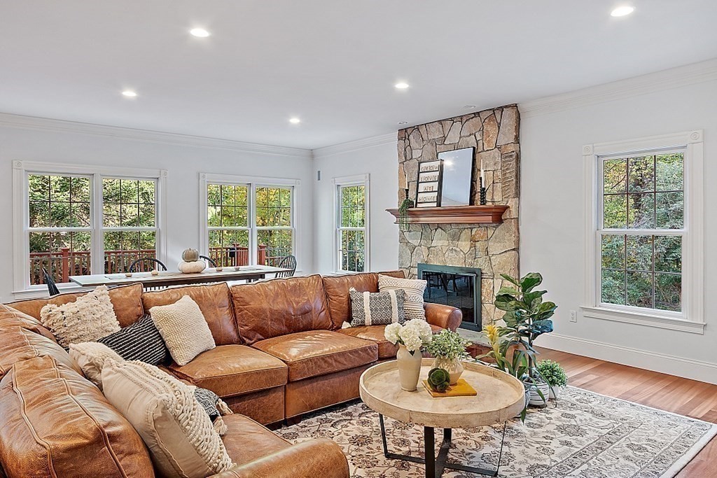 102 Claybrook Road Dover, MA 02030 - Photo 18 of 42 a living room with furniture a fireplace and window