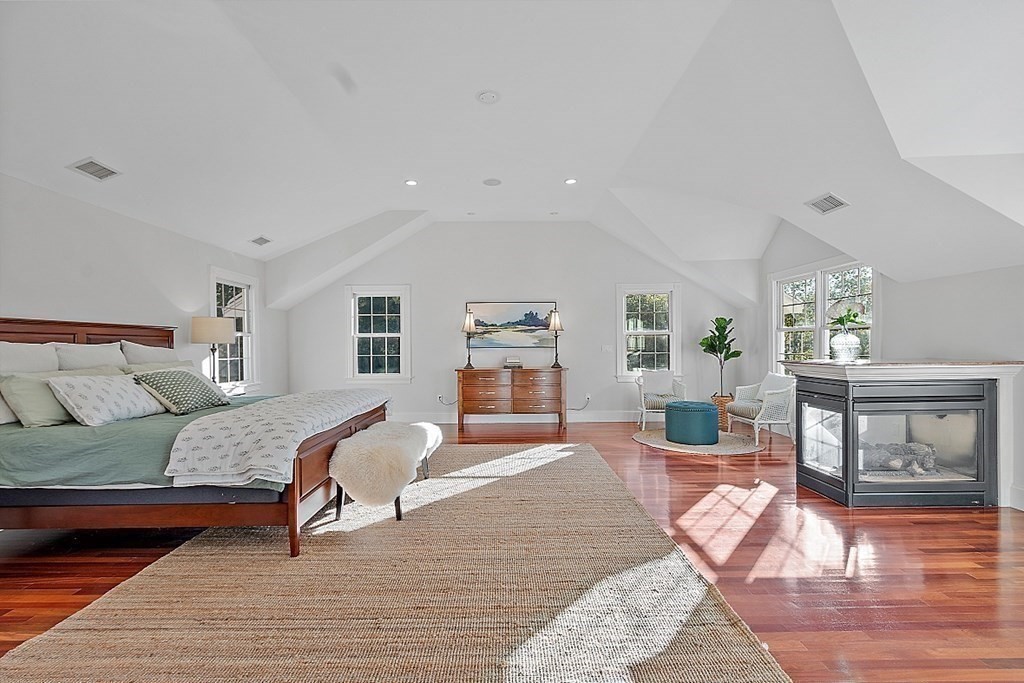 102 Claybrook Road Dover, MA 02030 - Photo 20 of 42 a bedroom with furniture and wooden floor