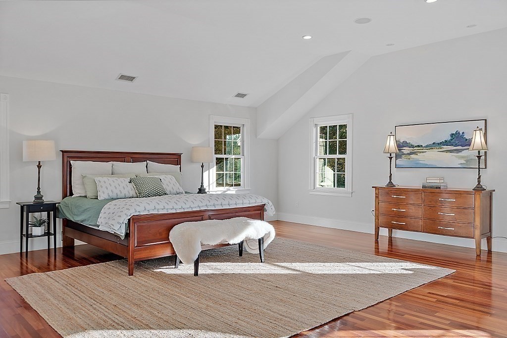 102 Claybrook Road Dover, MA 02030 - Photo 21 of 42 a bedroom with a bed and a dresser