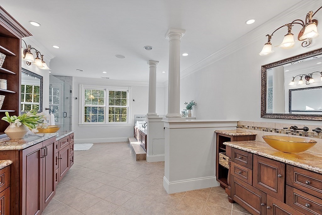 102 Claybrook Road Dover, MA 02030 - Photo 22 of 42 a spacious bathroom with a granite countertop tub sink and mirror