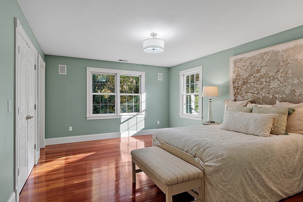 102 Claybrook Road Dover, MA 02030 - Photo 29 of 42 a spacious bedroom with a bed and a window