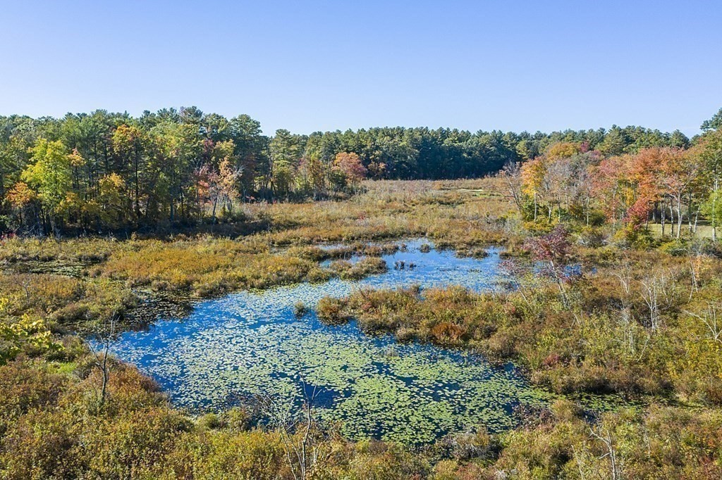 102 Claybrook Road Dover, MA 02030 - Photo 37 of 42 a view of a lake with mountains in the background