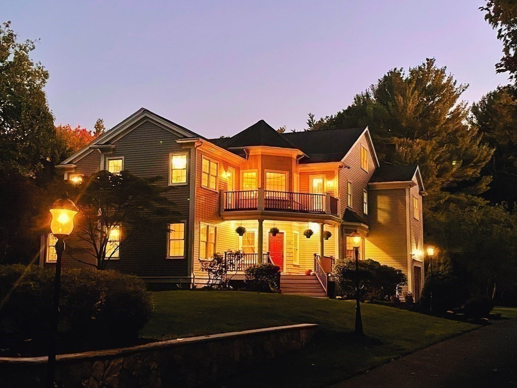 102 Claybrook Road Dover, MA 02030 - Photo 41 of 42 a front view of a house with a yard