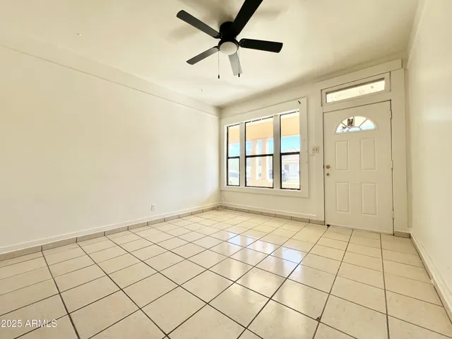 a view of an empty room and window