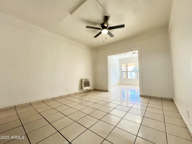 a view of an empty room and window