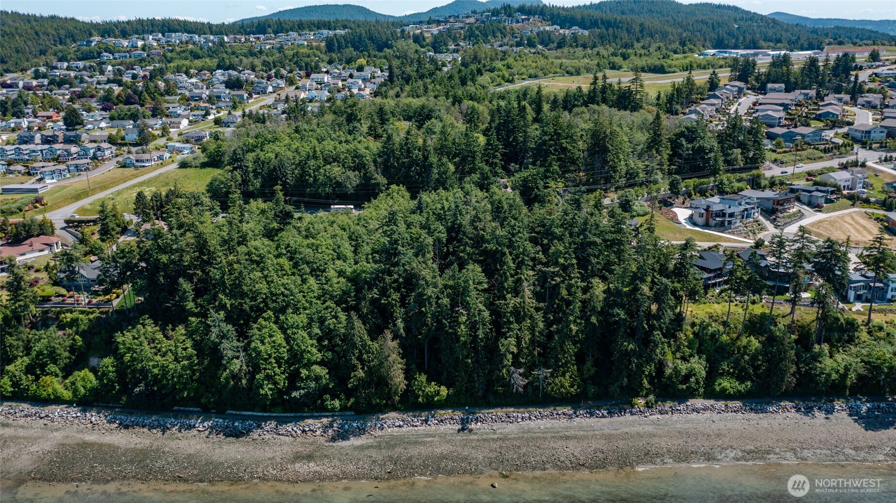 4100 Oakes Avenue Anacortes, WA 98221 - Photo 11 of 22 an aerial view of residential houses with outdoor space and trees