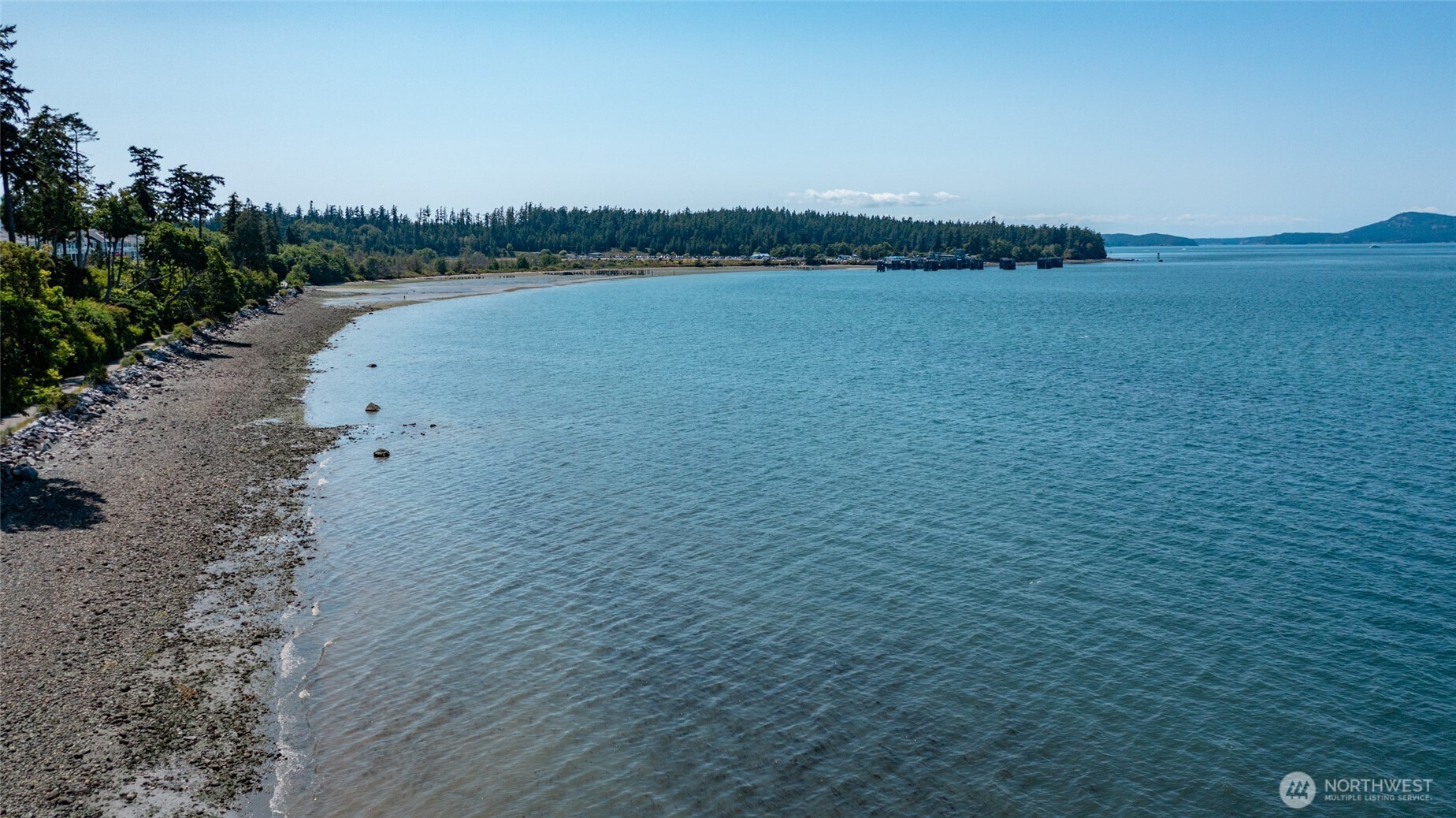 4100 Oakes Avenue Anacortes, WA 98221 - Photo 5 of 22 a view of a lake with houses in the back