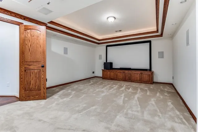 a view of a patio with couches table and chairs and potted plants