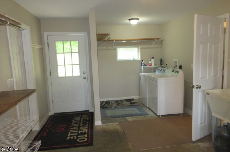 28 Beaver Run Road Lafayette, NJ 07848 - Photo 11 of 36 a room with a door open to a room