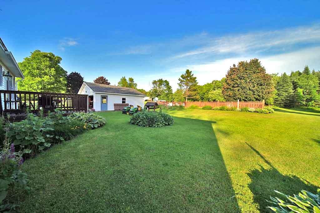 1196 Bangor Road Linneus, ME 04730 - Photo 45 of 66 lawn-pool-backyard