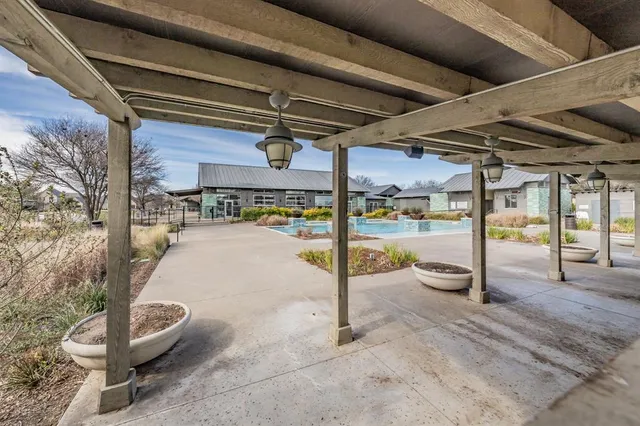 a view of a porch with furniture