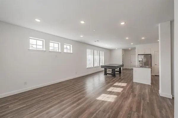 a view of kitchen with furniture and large window