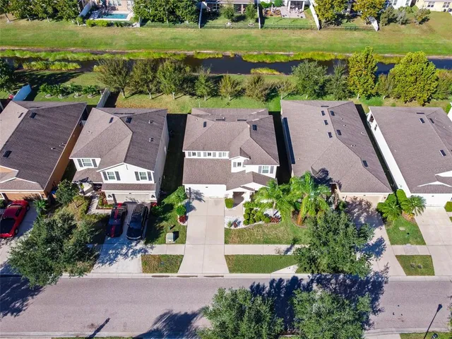 an aerial view of a house with a garden