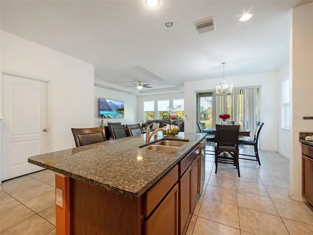 a kitchen with a stove and a refrigerator