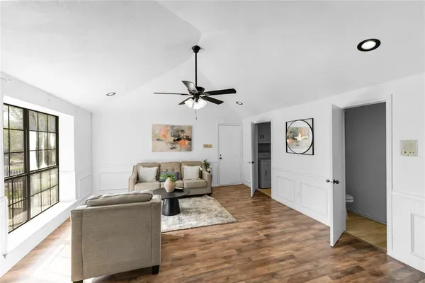 a living room with furniture and window