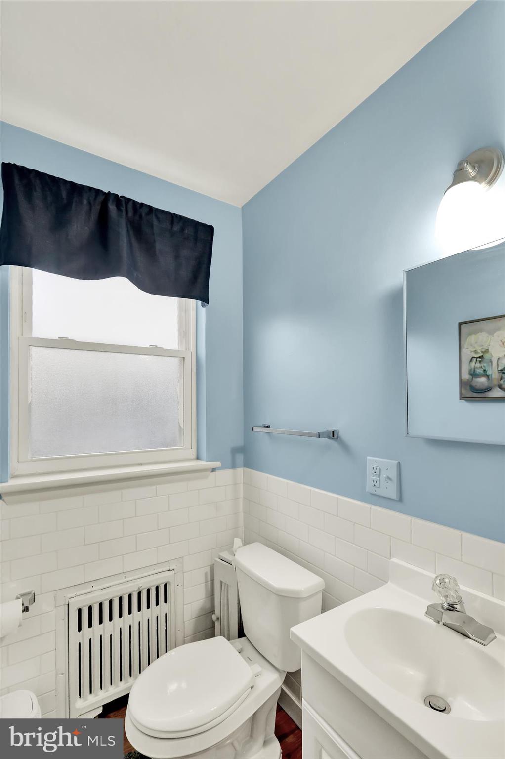 1027 Quentin Road Lebanon, PA 17042 - Photo 14 of 35 a bathroom with a sink and a toilet