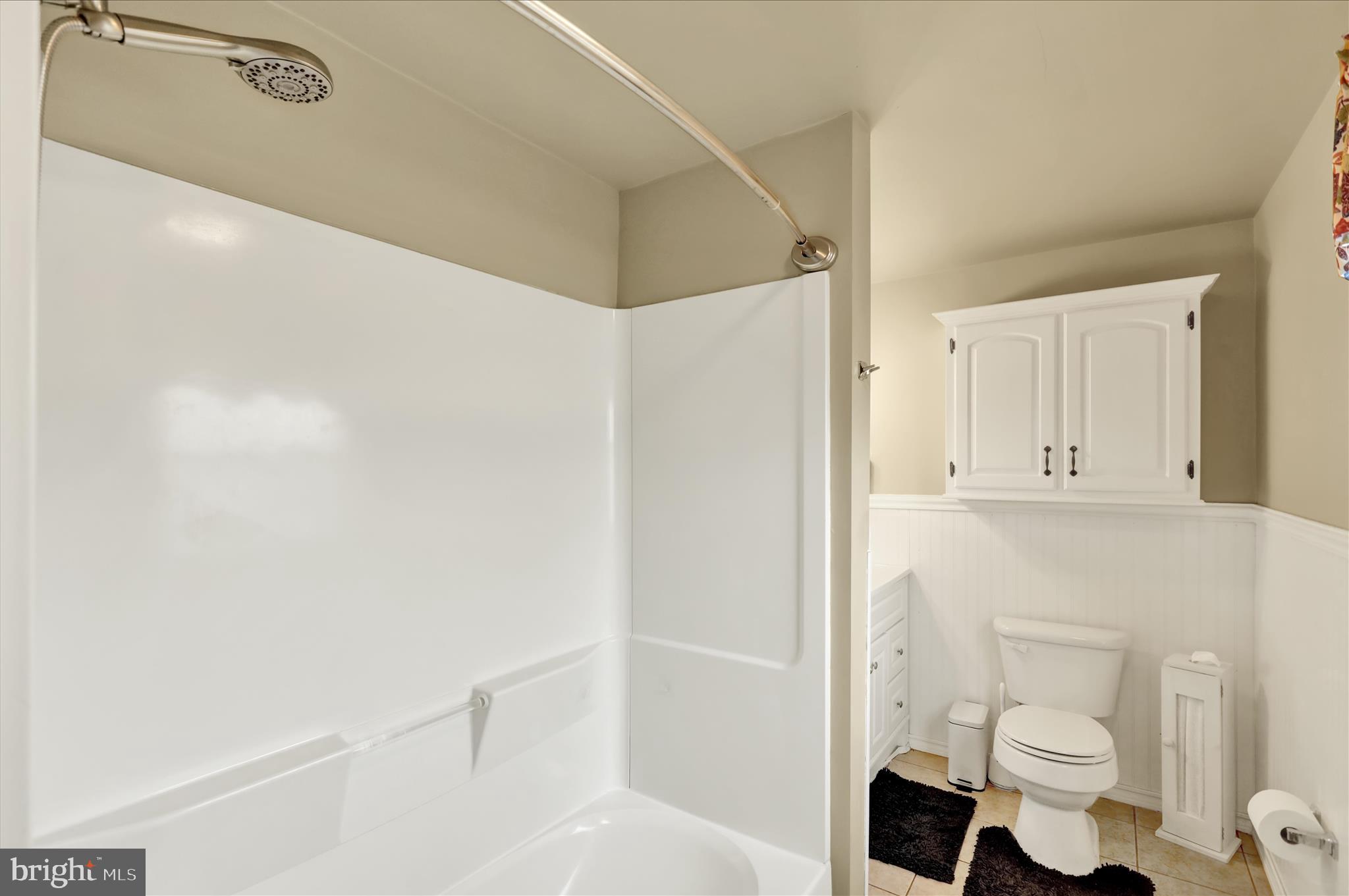 1027 Quentin Road Lebanon, PA 17042 - Photo 15 of 35 a bathroom with a toilet and a shower