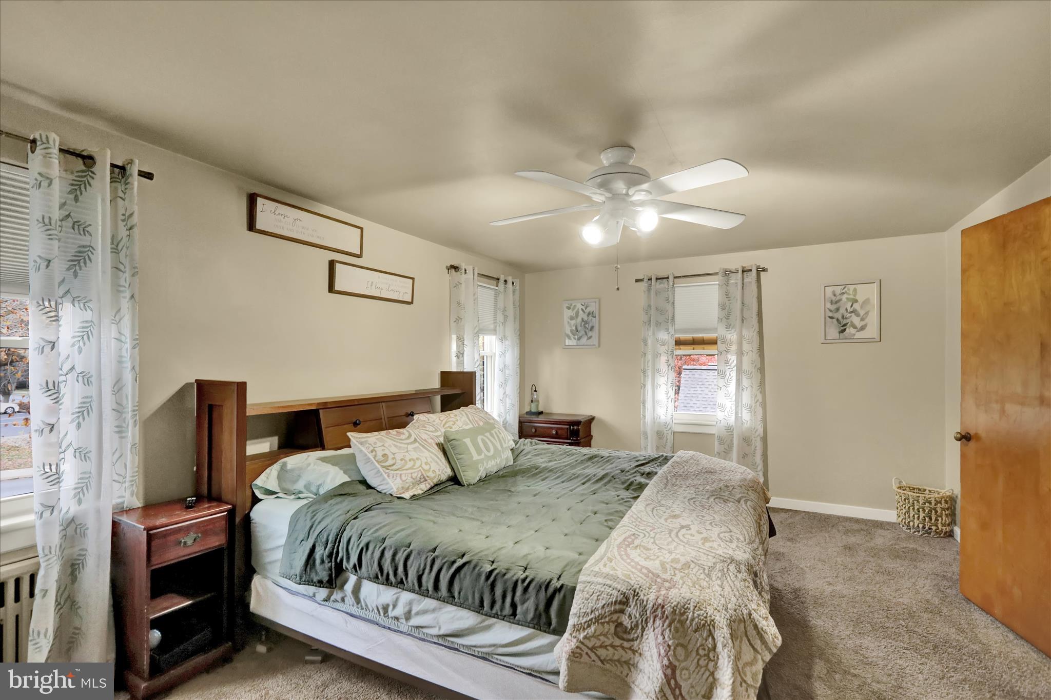 1027 Quentin Road Lebanon, PA 17042 - Photo 20 of 35 a bedroom with a bed and a ceiling fan