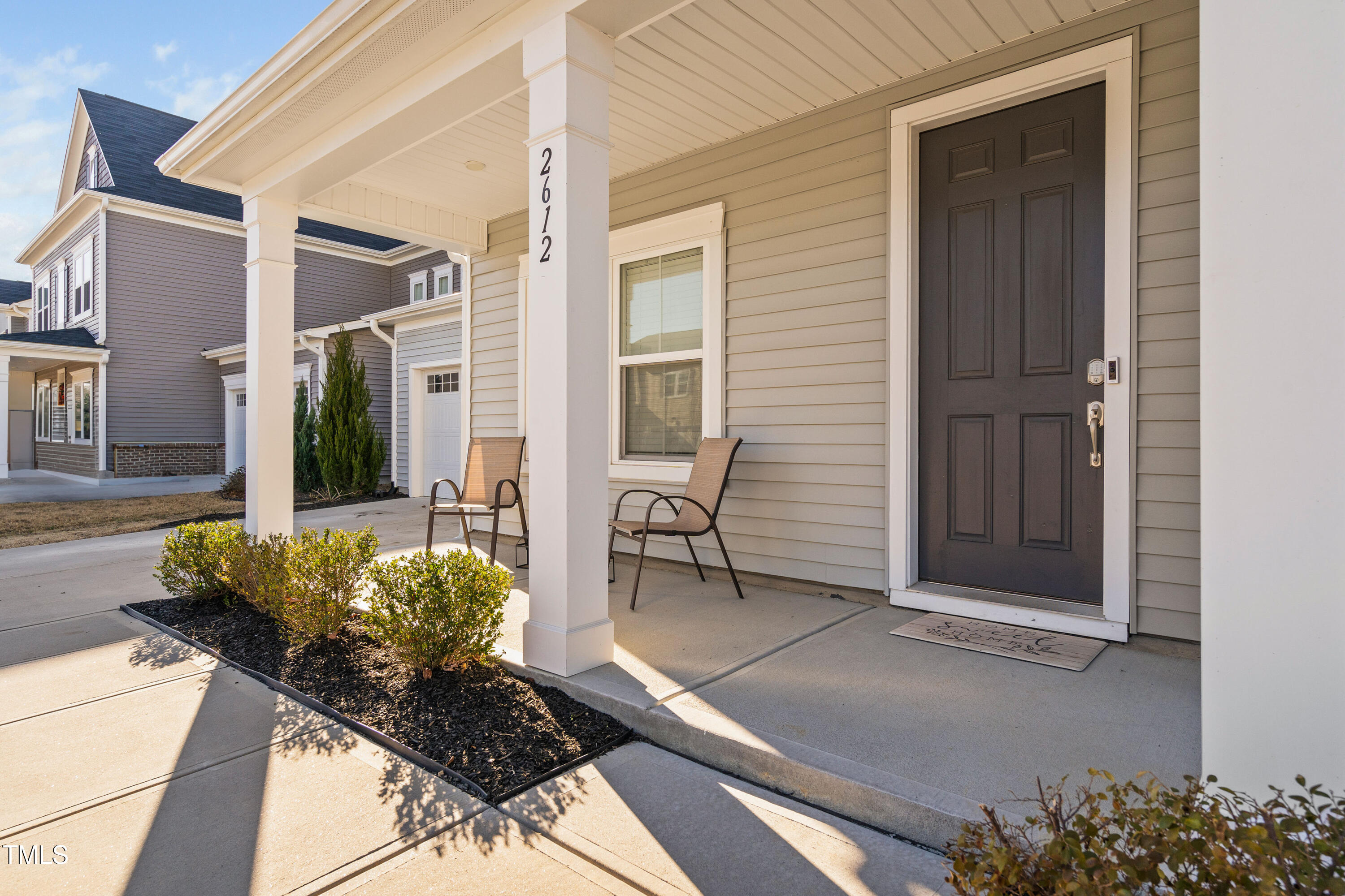 Enjoy sitting and relaxing on your front porch.