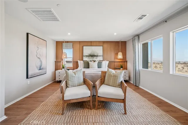 a view of a kitchen with a refrigerator and a window
