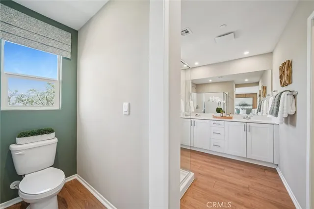 a room with white cabinets and entryway