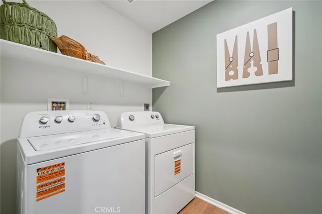 a spacious bathroom with a double vanity and a mirror