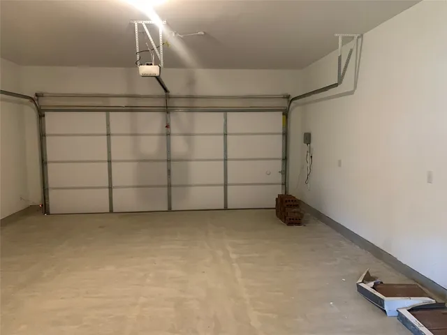 a white bath tub sitting next to a toilet