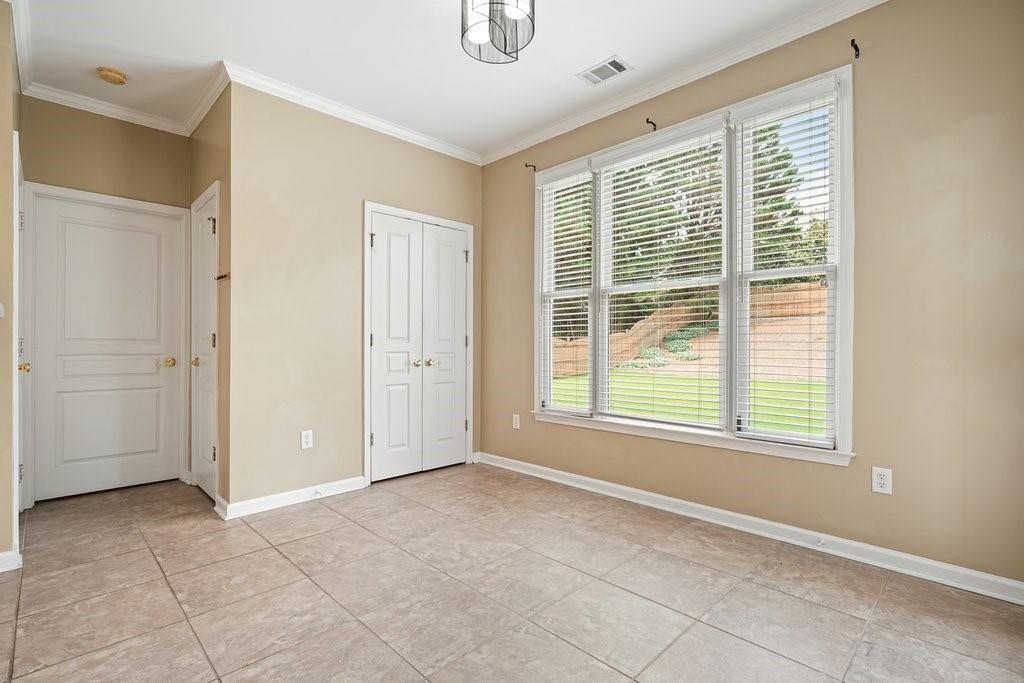 412 Middlebrooke Street Canton, GA 30115 - Photo 11 of 32 a view of an empty room with a window