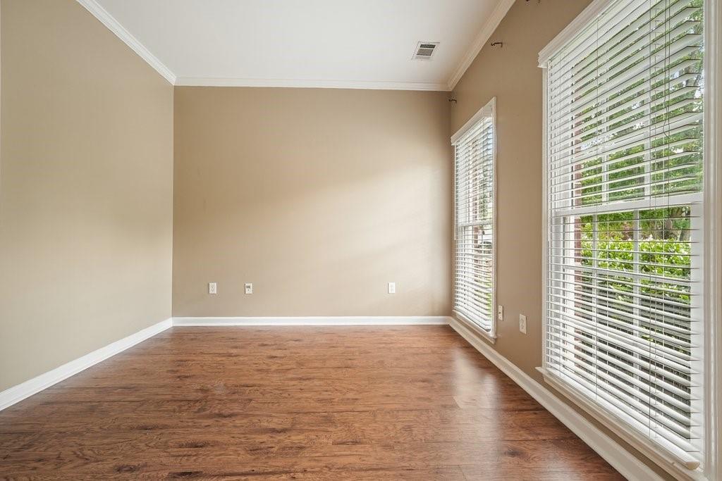 412 Middlebrooke Street Canton, GA 30115 - Photo 18 of 32 a view of an empty room with a window