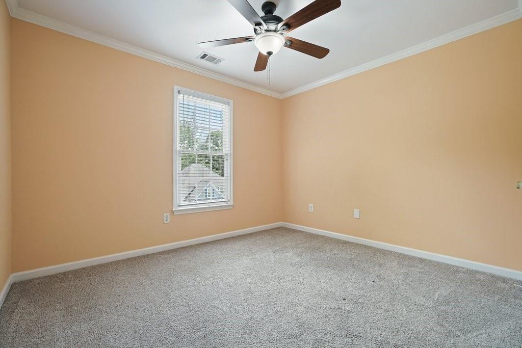 412 Middlebrooke Street Canton, GA 30115 - Photo 20 of 32 a view of an empty room with a window